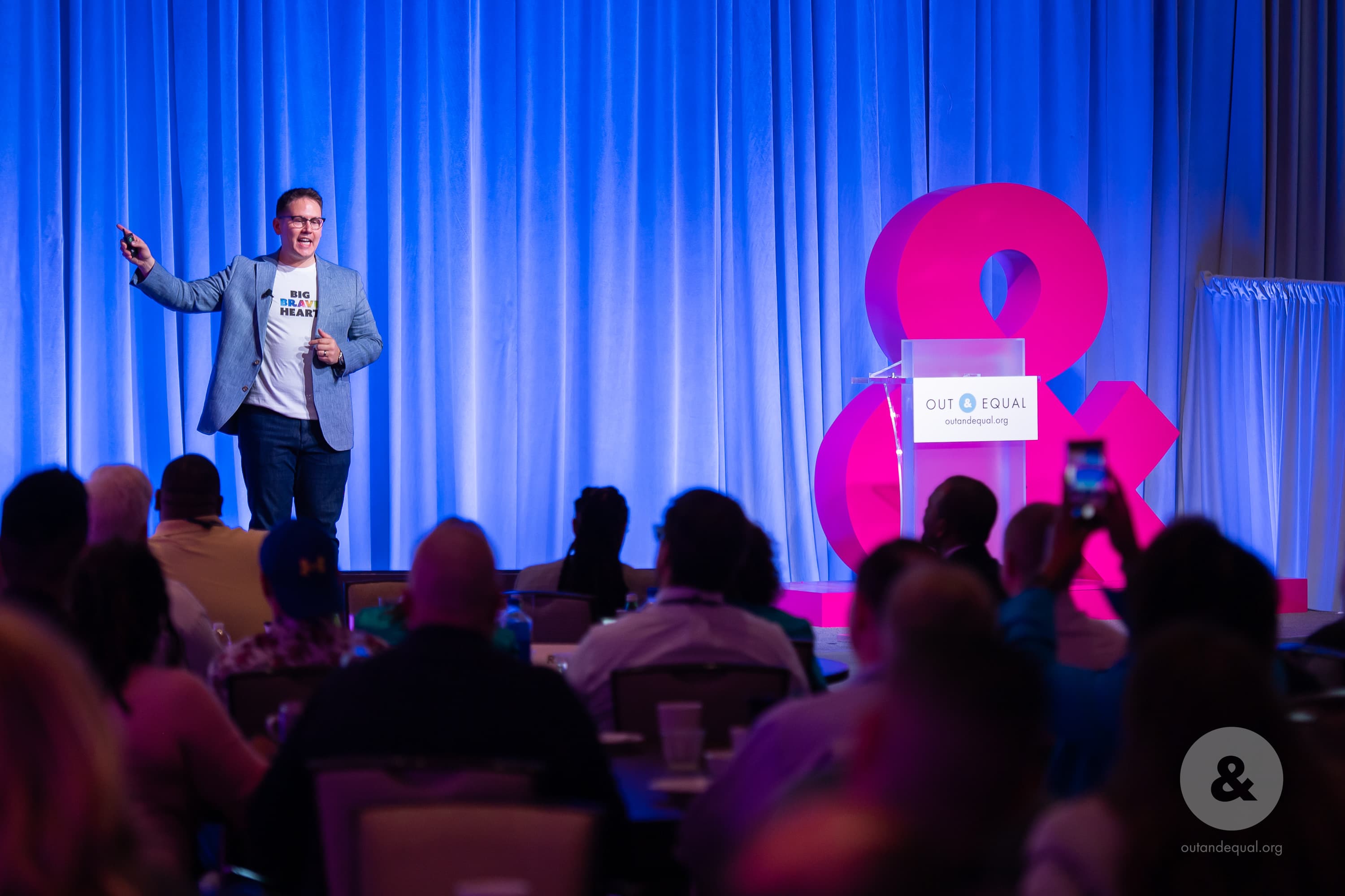 Julio speaking to a room of leaders